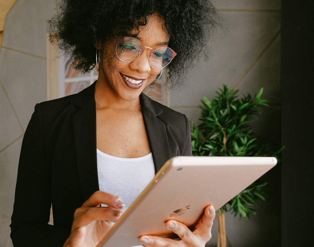 Young woman using tablet in office