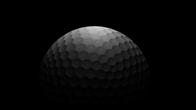 black and white image of golf ball