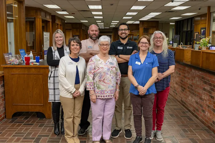 Vision Bank Sulphur employee group photo. 