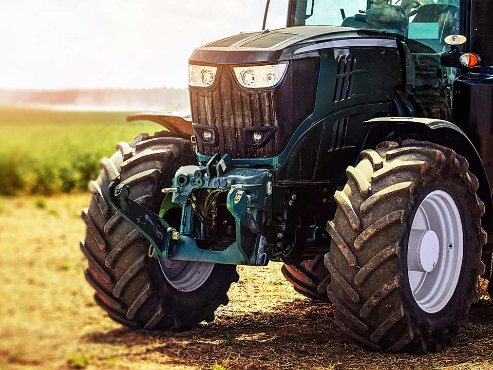 Tractor standing on open field 